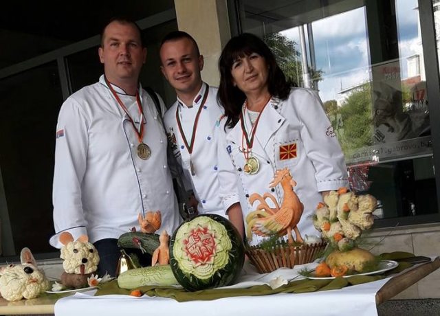 Dejan Ilić with colleagues, carving competition